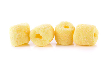 Crunchy corn snacks milk flavour on white background