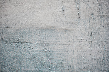 Roughly plastered gray wall. Backgrounds and textures