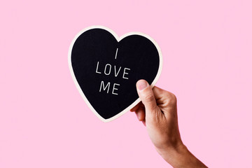 text I love me in a heart-shaped sign - obrazy, fototapety, plakaty