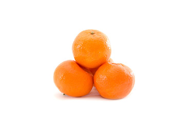 mandarin in hand isolated on white background.