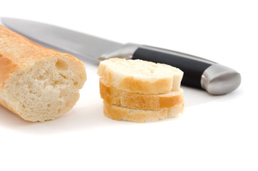 baguette and knife on a white background