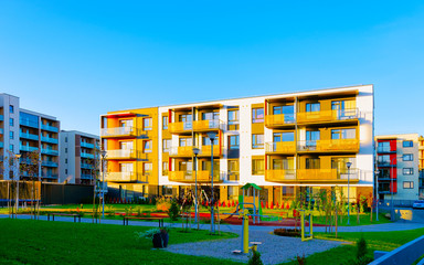 Apartment residential house facade architecture and kids playground reflex