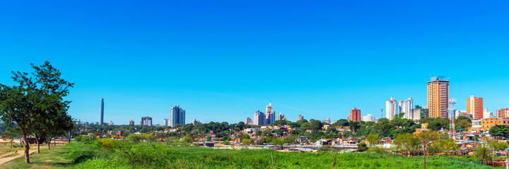 Fototapeta na wymiar Skyscrapers and city buildings, Asuncion, Paraguay. City landscape. Copy space for text.
