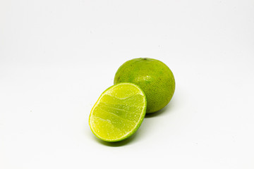 fresh green lime on white background