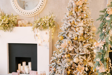 Christmas decor, snow Christmas tree and fireplace