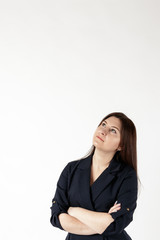 Fototapeta premium Young woman in blue full of doubts and hesitation.