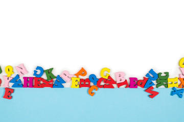 Row of multicolored letters isolated on a white background.