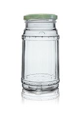 Empty glass jar closed with an iron lid. Isolated on white background with reflection