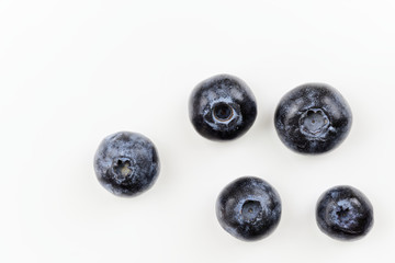 Directly above of fresh blueberries isolated on white background