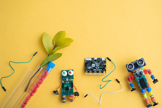 Minsk, Belarus. December, 2019. The BBC robot Micro Bit and metal robot. It can be programming on Scratch or Python. Creative, coding, learning. STEM and STEAM education. AI. DIY. Free space for text.