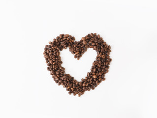 Coffee beans arranged as heart shape