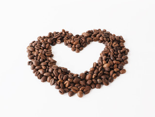 Coffee beans arranged as heart shape