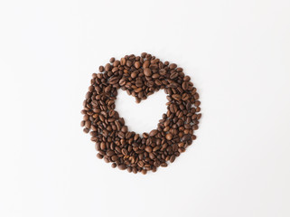Coffee beans arranged as heart shape