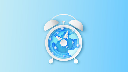 Creative design of winter landscape inside the alarm clock in the Mid morning. Alarm clock design for Winter. paper cut and craft style. vector, illustration.