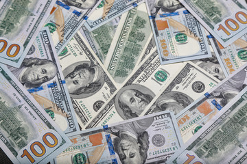 different dollar bills as background