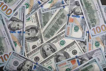 different dollar bills as background