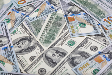 different dollar bills as background
