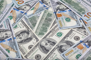 different dollar bills as background