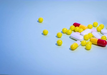 colorful pills close up on a light background