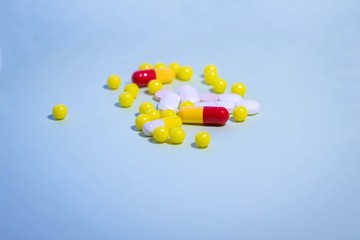 colorful pills close up on a light background