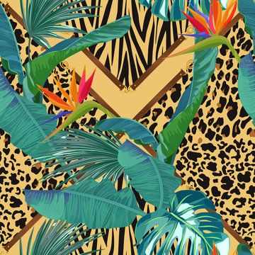 Abstract fashion seamless pattern with palm leaves, strelitzia and tiger and leopard elements. Animal print
