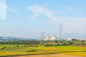 Fototapeta na wymiar Landscape of green farm and river with high speed rail background at Taichung