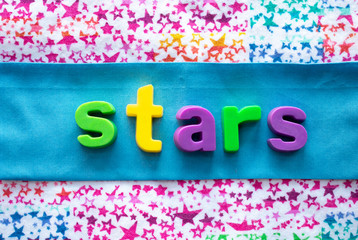 the word stars on a colorfull background