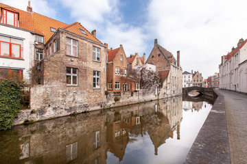 Fototapeta premium Beautiful houses along the canals of Brugge, Belgium. Tourism destination in Europe