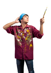 Young male artist holding paintbrush