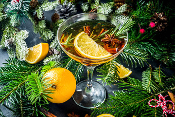 Christmas winter alcohol cocktail julig aperol spritz, with orange, rosemary and spices
