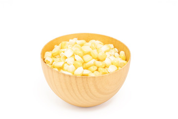 sweet corn seeds in wooden bowl isolated on white background