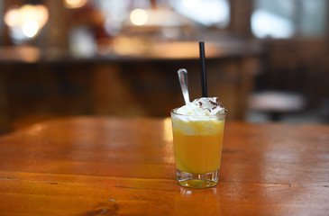 Christmas Bombardino cocktail with egg liqueur and rum. Italian cream hot drink. Italy, Europe.
