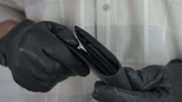 Pickpocket with someone else's wallet.