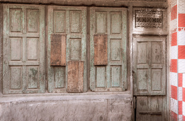 green wooden window in marrakech