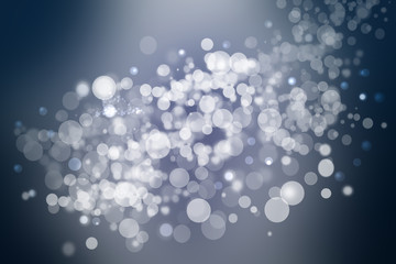 Abstract festive gradient dark blue gray silver bokeh background texture with white bokeh lights. Beautiful backdrop with space for christmas, invitation, or other holidays.