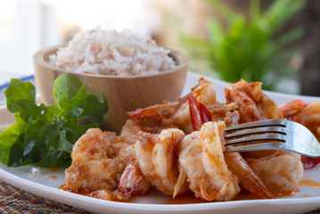 Close up Thai dish. Fresh shrimp stir fry with garlic sauce. Eat together with Thai rice.