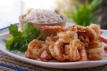Close up Thai dish. Fresh shrimp stir fry with garlic sauce. Eat together with Thai rice.