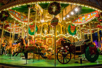 Fototapeta na wymiar Beautiful big christmas carousel with lights