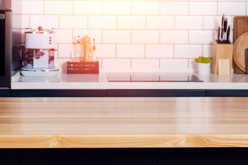 Close up shot of counter top or wooden table on the modern kitchen