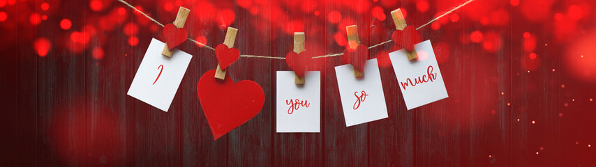 Happy Valentine's Day background banner panorama long - White paper note hang on wooden clothes...
