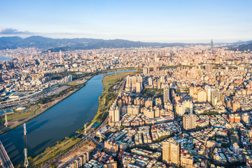Obraz premium Taipei City Aerial View - Asia business concept image, panoramic modern cityscape building bird’s eye view under daytime and blue sky, shot in Taipei, Taiwan.