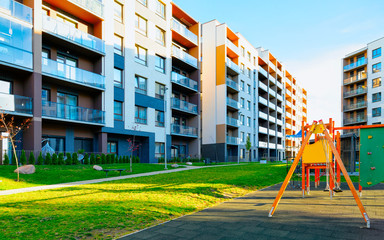 Apartment residential house facade architecture with children playgrounds reflex