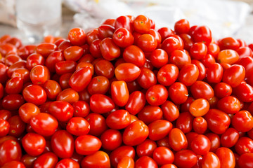Red tomatoes. Tomato background. cherry tomato. Group of fresh tomatoes.