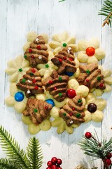 Homemade assorted  X'mas spritz sugar cookies on festive holiday white background