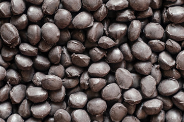 Black polymer dye in granules, background texture