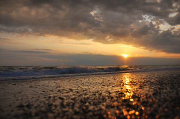 Sunset on the sea at low tide