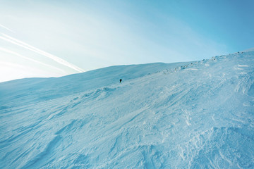Tourist in the wild. Snow storm, despair. Lost his way. Ural winter landscape with giant frozen...