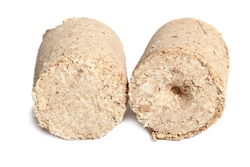 Wood briquette. Isolated on a white background.
