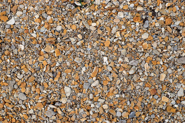 Sea pebbles. Small stones gravel texture background.Pile of pebbles, thailand.