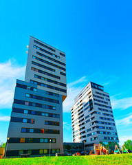 Modern residential building skyscrapers in Baltupiai district of Vilnius reflex